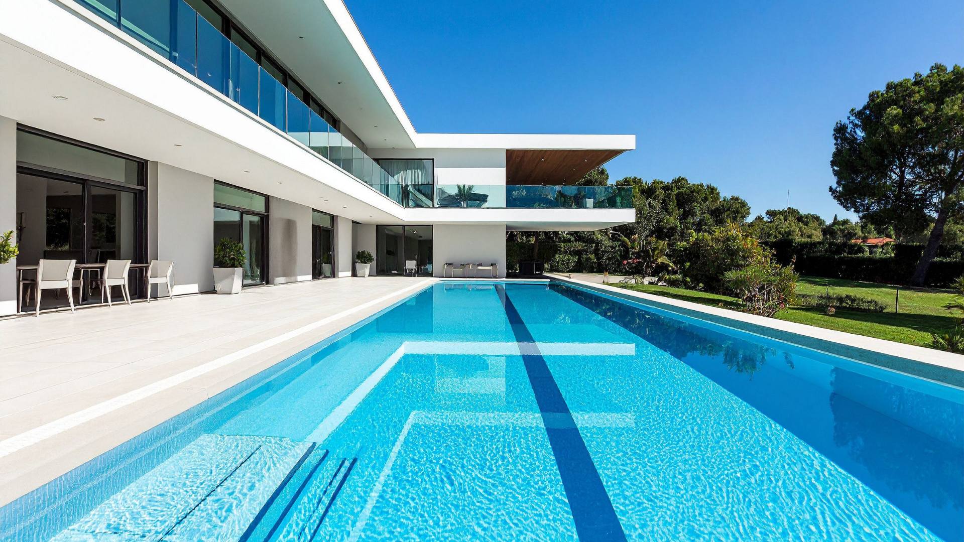 Luxury backyard vinyl swimming pool installed in Southern California